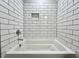 Crisp bathroom featuring a white tub with subway tile surround, offering a clean and modern aesthetic at 310 Woodland Shores Rd, Charleston, SC 29412