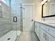 Well-lit bathroom featuring large glass shower and white shaker style vanity at 310 Woodland Shores Rd, Charleston, SC 29412