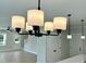 Dining room with modern lighting fixture and view into the living room at 310 Woodland Shores Rd, Charleston, SC 29412