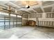 View of the spacious two-car garage with ample lighting at 310 Woodland Shores Rd, Charleston, SC 29412