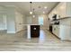 Modern kitchen featuring two-tone cabinets, stainless steel appliances, and a kitchen island at 310 Woodland Shores Rd, Charleston, SC 29412