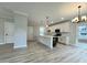 Contemporary kitchen features an island, modern appliances, and a stylish lighting fixture at 310 Woodland Shores Rd, Charleston, SC 29412