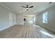 Spacious living area showcases durable floors, natural light, and connects to the kitchen at 310 Woodland Shores Rd, Charleston, SC 29412