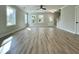 Spacious living room with wood floors and large windows for natural light at 310 Woodland Shores Rd, Charleston, SC 29412