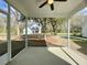 View from the screened-in porch of the home and large backyard at 310 Woodland Shores Rd, Charleston, SC 29412