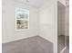 Spacious walk-in closet with adjustable shelving and a bright window at 342 Saxony Loop, Summerville, SC 29486