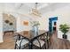 Elegant dining room adjacent to the entryway featuring wood-look floors and unique wallpaper at 342 Saxony Loop, Summerville, SC 29486