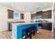 Modern kitchen featuring a center island with seating, granite countertops, and stainless steel appliances at 342 Saxony Loop, Summerville, SC 29486
