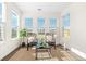 Bright sunroom featuring wicker chairs, an area rug and lots of natural light at 342 Saxony Loop, Summerville, SC 29486