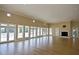 This stunning ballroom features hardwood floors, elegant lighting, and large windows at 401 Forsythia Ave, Summerville, SC 29483