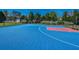 Brightly colored outdoor basketball court, perfect for recreational games and athletic activities at 401 Forsythia Ave, Summerville, SC 29483