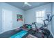 Home gym with Peloton bike, free weights, and ample space for workouts at 401 Forsythia Ave, Summerville, SC 29483