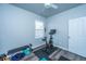 Bright home gym features exercise bike, weight bench, and soft blue-grey walls at 401 Forsythia Ave, Summerville, SC 29483
