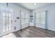 Inviting foyer with bright windows, stylish curtains, and a door, creating a warm welcome to the home at 401 Forsythia Ave, Summerville, SC 29483
