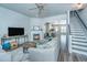 Inviting living room with a cozy fireplace, modern furnishings, and an open layout at 401 Forsythia Ave, Summerville, SC 29483