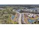 Expansive aerial view of the community featuring serene ponds and lush green spaces nestled amongst beautiful homes at 4075 Aspera Dr, Summerville, SC 29483