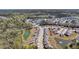 An extensive view of a neighborhood with ponds, manicured lawns, and mature trees in a Primary-planned community at 4075 Aspera Dr, Summerville, SC 29483