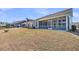A backyard showing a large screened porch and backyard at 4075 Aspera Dr, Summerville, SC 29483