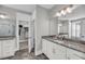 Bathroom with double vanity, granite countertops, and access to large walk-in shower and walk-in closet at 4075 Aspera Dr, Summerville, SC 29483