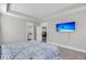 Bedroom with a bed and TV and an ensuite bathroom with large walk-in shower at 4075 Aspera Dr, Summerville, SC 29483
