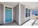 Charming front door, light gray siding, and white trim create a welcoming entrance at 4075 Aspera Dr, Summerville, SC 29483