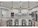 Open kitchen with a large island, granite countertops, and stainless steel appliances, perfect for entertaining at 4075 Aspera Dr, Summerville, SC 29483