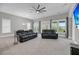 Open living room with comfortable seating, a ceiling fan, and lots of natural light at 4075 Aspera Dr, Summerville, SC 29483