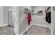 Walk-in closet with plenty of shelving, storage, and open access to the ensuite bathroom with shower at 4075 Aspera Dr, Summerville, SC 29483