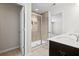 Modern bathroom features a glass-enclosed shower and double sink vanity at 410 Avocet Dr, Summerville, SC 29486