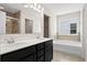 Bathroom features double sinks, soaking tub, and a glass-enclosed shower at 410 Avocet Dr, Summerville, SC 29486