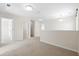 Spacious loft with neutral carpet and bright natural light creates versatile living area at 410 Avocet Dr, Summerville, SC 29486