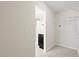 A walk-in closet offering shelving and carpeted floor, adjacent to a bathroom with vanity and a toilet at 410 Avocet Dr, Summerville, SC 29486