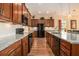 Spacious kitchen featuring granite countertops, stainless appliances and dark wood cabinetry at 415 Four Seasons Blvd, Summerville, SC 29486