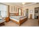 Inviting main bedroom features stylish decor, cozy carpet, and tray ceiling for comfortable living at 415 Four Seasons Blvd, Summerville, SC 29486