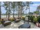 Outdoor patio with seating area overlooking a lake at 415 Four Seasons Blvd, Summerville, SC 29486