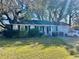 Charming single-story home with brick exterior and well-maintained lawn at 4228 Oakridge Dr, North Charleston, SC 29418