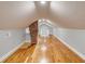 Finished attic with hardwood floors, good lighting and exposed brick chimney at 4625 Durant Ave, North Charleston, SC 29405
