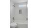 Clean bathroom with a tiled shower and a convenient shower niche at 4625 Durant Ave, North Charleston, SC 29405