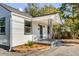 Charming front porch detailed with decorative ironwork and a cozy entrance at 4625 Durant Ave, North Charleston, SC 29405