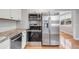 Close-up of modern kitchen appliances, including a stainless steel refrigerator and oven at 4625 Durant Ave, North Charleston, SC 29405