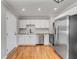 Modern kitchen featuring stainless steel appliances and bright white cabinets at 4625 Durant Ave, North Charleston, SC 29405