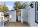 Convenient outdoor laundry room features a washer and dryer with ample lighting and easy access from the deck at 4625 Durant Ave, North Charleston, SC 29405