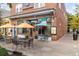 Charming restaurant with outdoor seating, featuring tables with umbrellas and a cozy atmosphere at 4625 Durant Ave, North Charleston, SC 29405