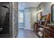 Unique bathroom with stone wall shower and vessel sinks at 5208 Holly Forest, Hollywood, SC 29449
