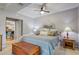 Inviting bedroom with wood floors, a comfortable queen-sized bed, and natural lighting at 5208 Holly Forest, Hollywood, SC 29449