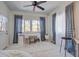 Bright bedroom with a ceiling fan, desk, a plush rug and sheer curtains at 5208 Holly Forest, Hollywood, SC 29449
