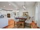 Elegant dining area adjoining the kitchen, featuring a dark wood table and comfortable upholstered chairs at 5208 Holly Forest, Hollywood, SC 29449