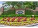 Welcoming entrance sign amidst colorful flower beds and lush greenery at The Plantation at Stono Ferry at 5208 Holly Forest, Hollywood, SC 29449