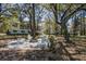 Inviting backyard with a stone firepit and comfortable seating, perfect for entertaining guests at 5208 Holly Forest, Hollywood, SC 29449