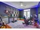 This stylish game room features guitars on the wall, wood floors, and a gaming rig at 5208 Holly Forest, Hollywood, SC 29449